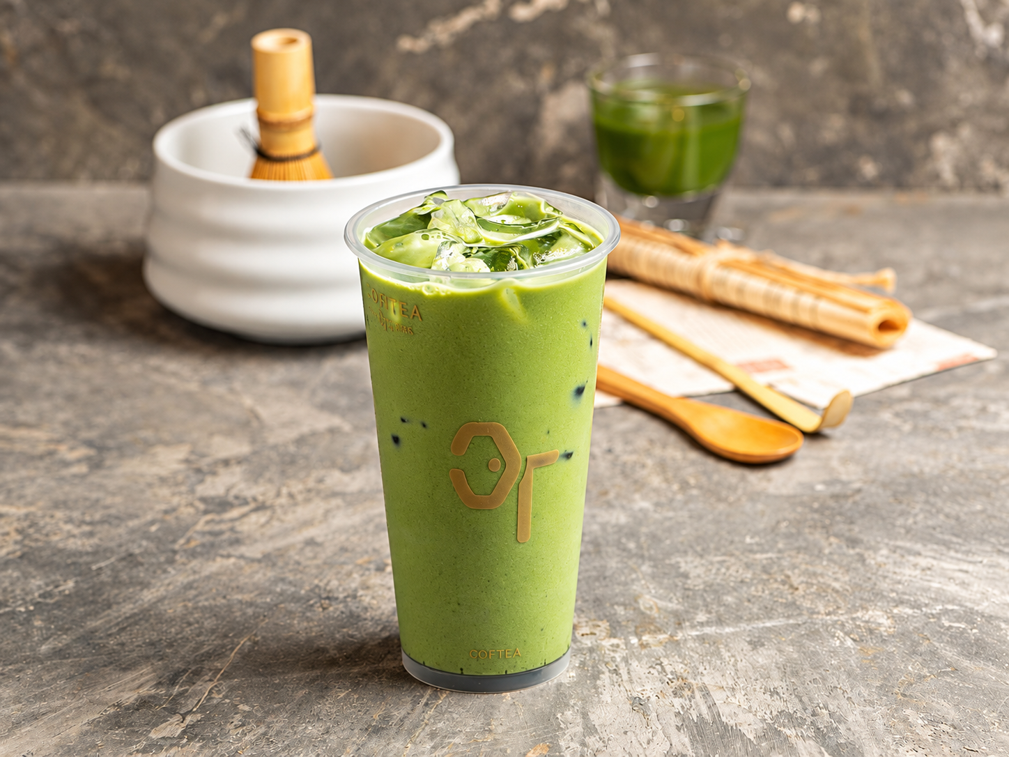 Coftea iced matcha in branded cup