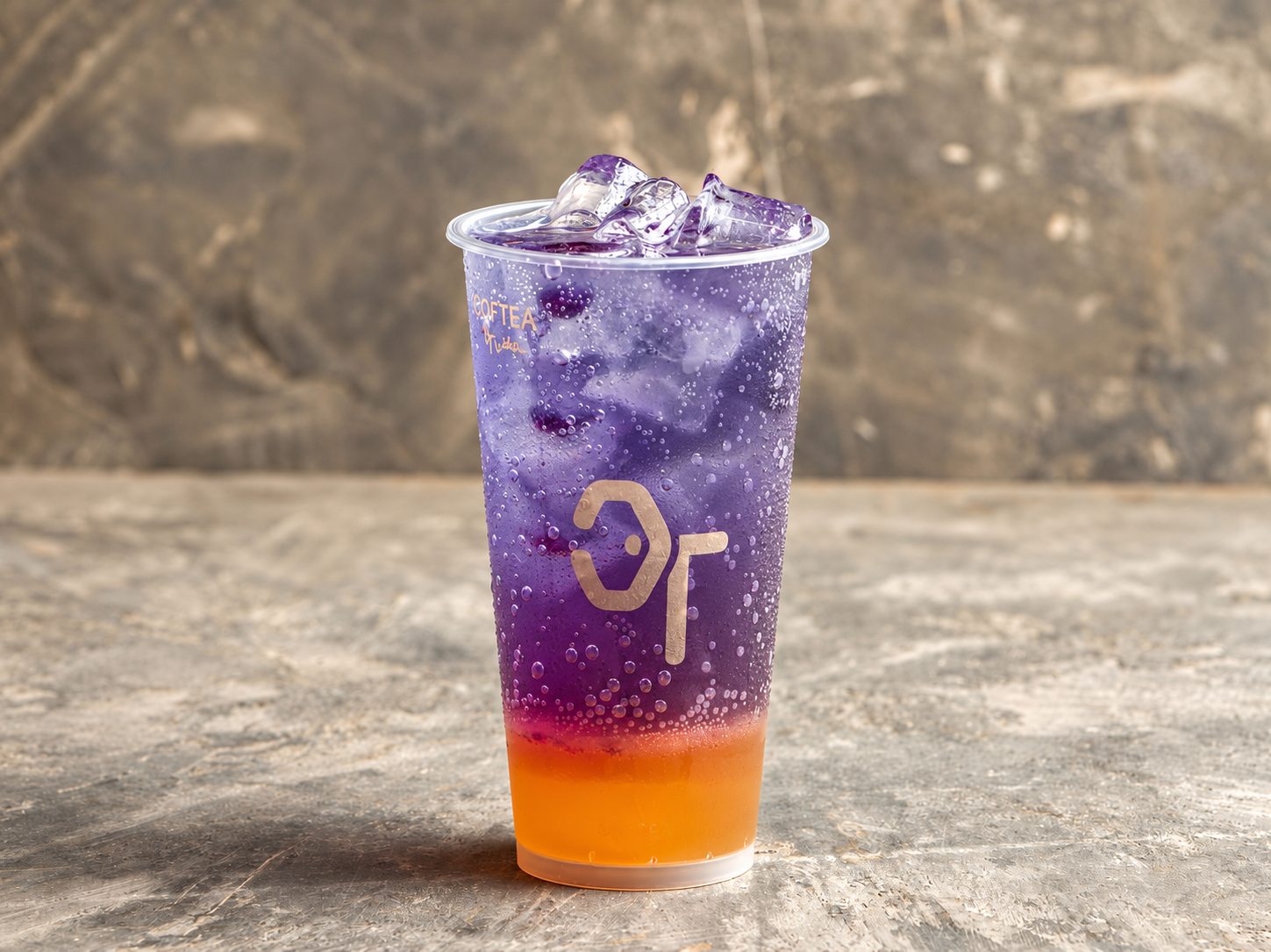 A purple Coftea mojito in a branded cup